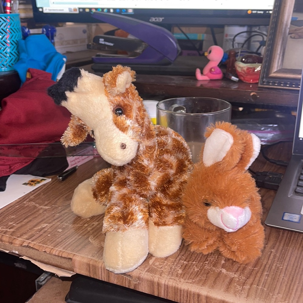 Small giraffe and bunny plush